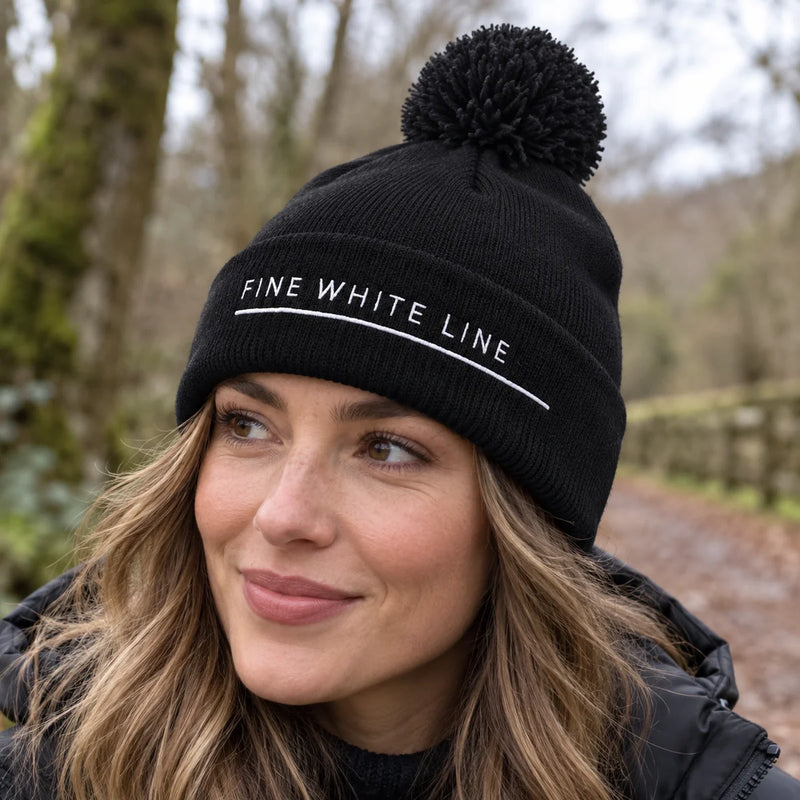Pom Pom Black Beanie — product photograph