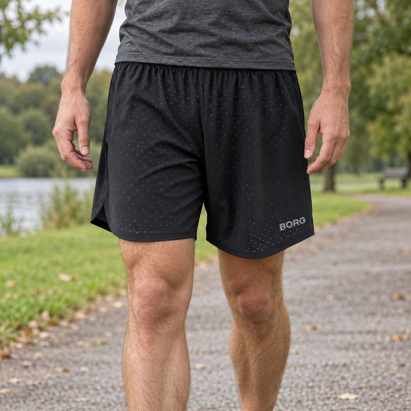 Running Breathable and Lightweight Perforated Sport Shorts for Men — product photograph